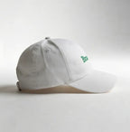 Vista lateral boné brasil feminino VAI DAR BRASIL com fecho snapback e aba curva — Copa 2026