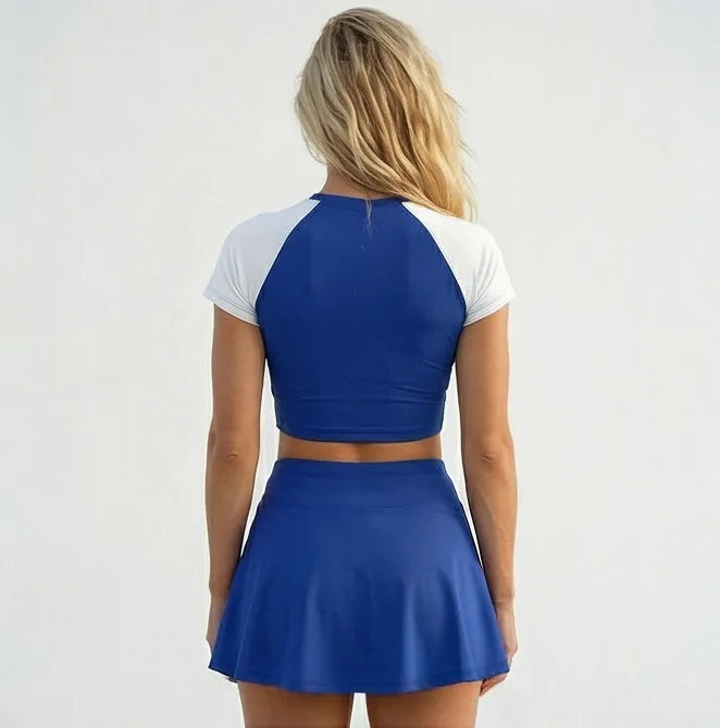 Vista traseira conjunto brasil cropped manga short saia suplex slim azul feminino VAI DAR BRASIL — Copa 2026