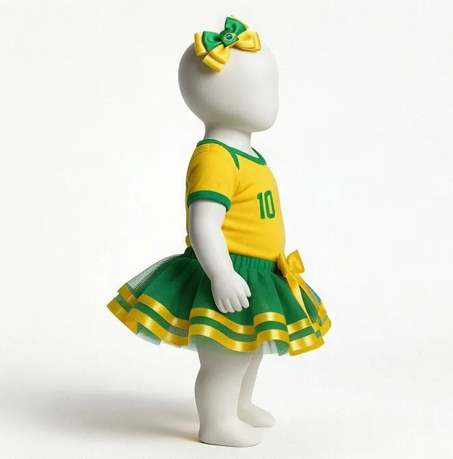 Vista lateral kit body bebê brasil saia laço amarelo feminino VAI DAR BRASIL — infantil Copa 2026