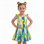 Menina vestindo vestido infantil coração brasil seda verde amarelo — look Copa 2026 VAI DAR BRASIL encanto afetivo