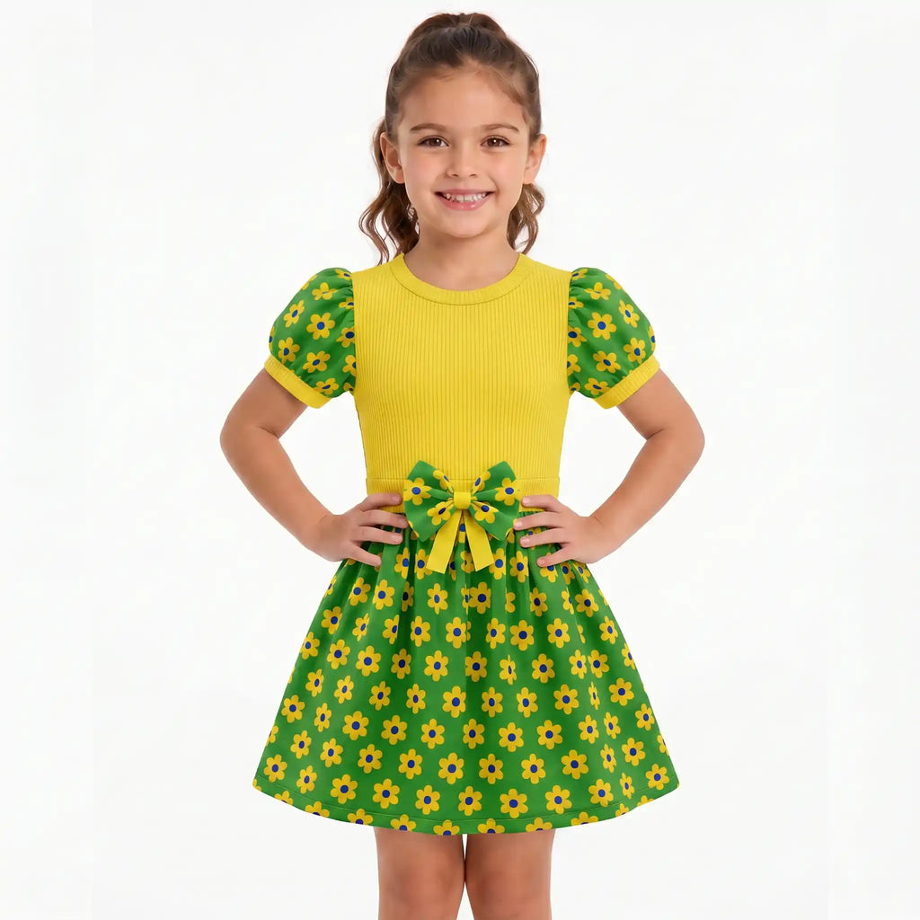 Menina vestindo vestido infantil floral brasil flores verde amarelo — look festa torcida Copa 2026 VAI DAR BRASIL encanto